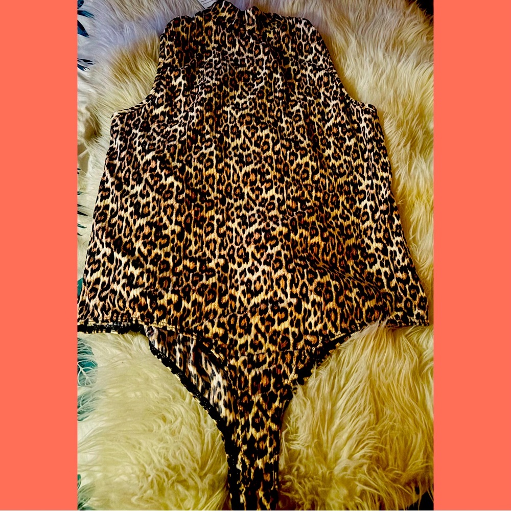💜NWT cheetah print bodysuit💜